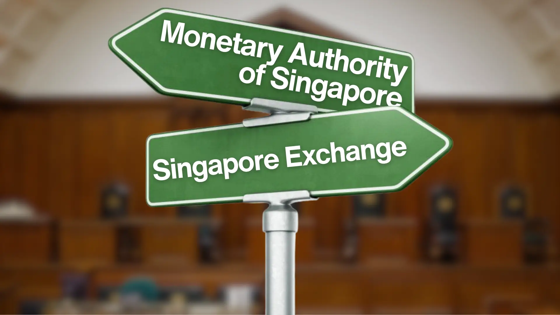 Two green directional signboards on pole, top labeled “Monetary Authority of Singapore” pointing left, bottom labeled “Singapore Exchange” pointing right, indoor background with wooden paneling.
